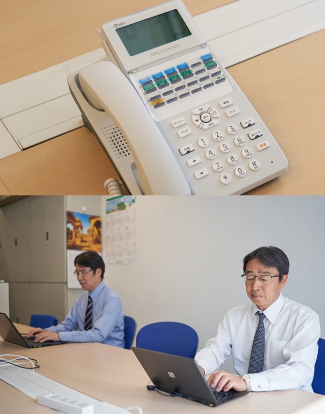 イメージ:移転を機に電話やテーブルは新調。出社時はフィジカル・ディスタンスを保っての業務