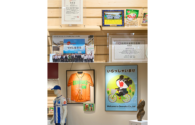 本社屋の入り口の展示スペース。各種表彰状やスポンサーを務めるサッカーJ2チーム「モンテディオ山形」のユニフォームなどが飾られている