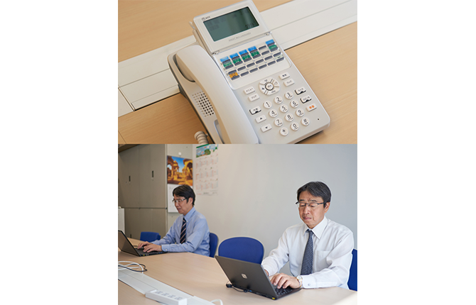移転を機に電話やテーブルは新調。出社時はフィジカル・ディスタンスを保っての業務