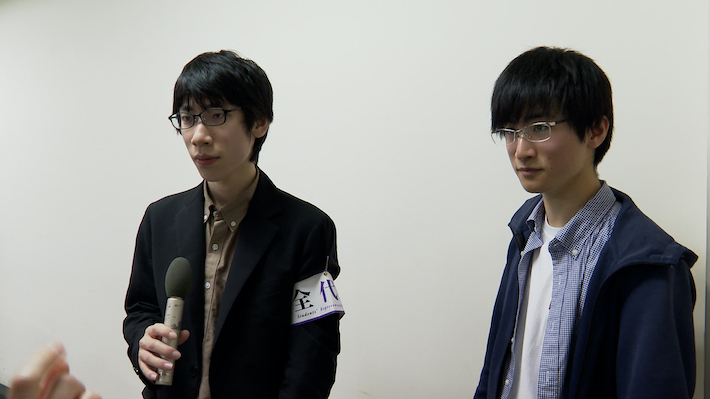 画像：筑波大学 情報学群 情報科学類 ３年の菊田一真さん（写真左）、 同４年の今村将太さん（写真右）